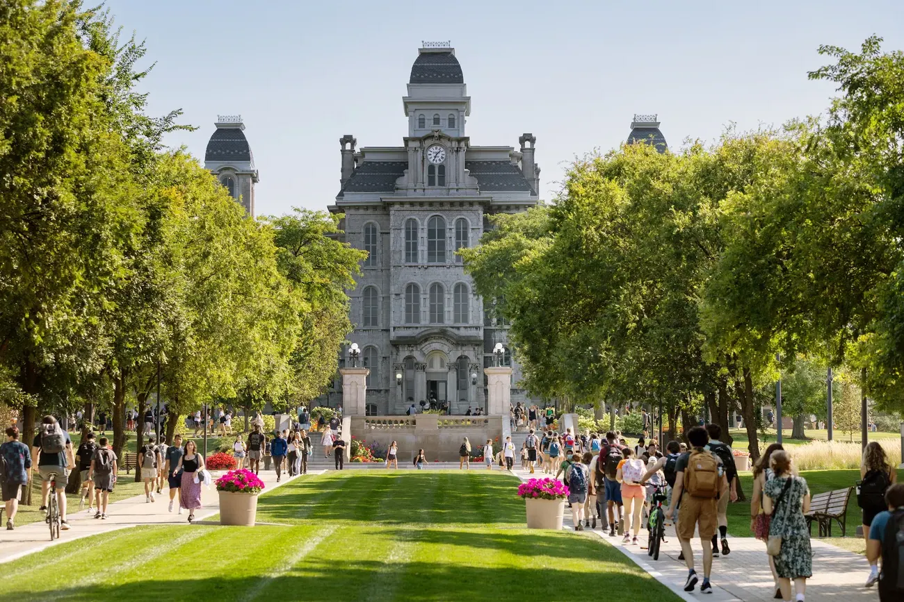 Students walking outside on campus.